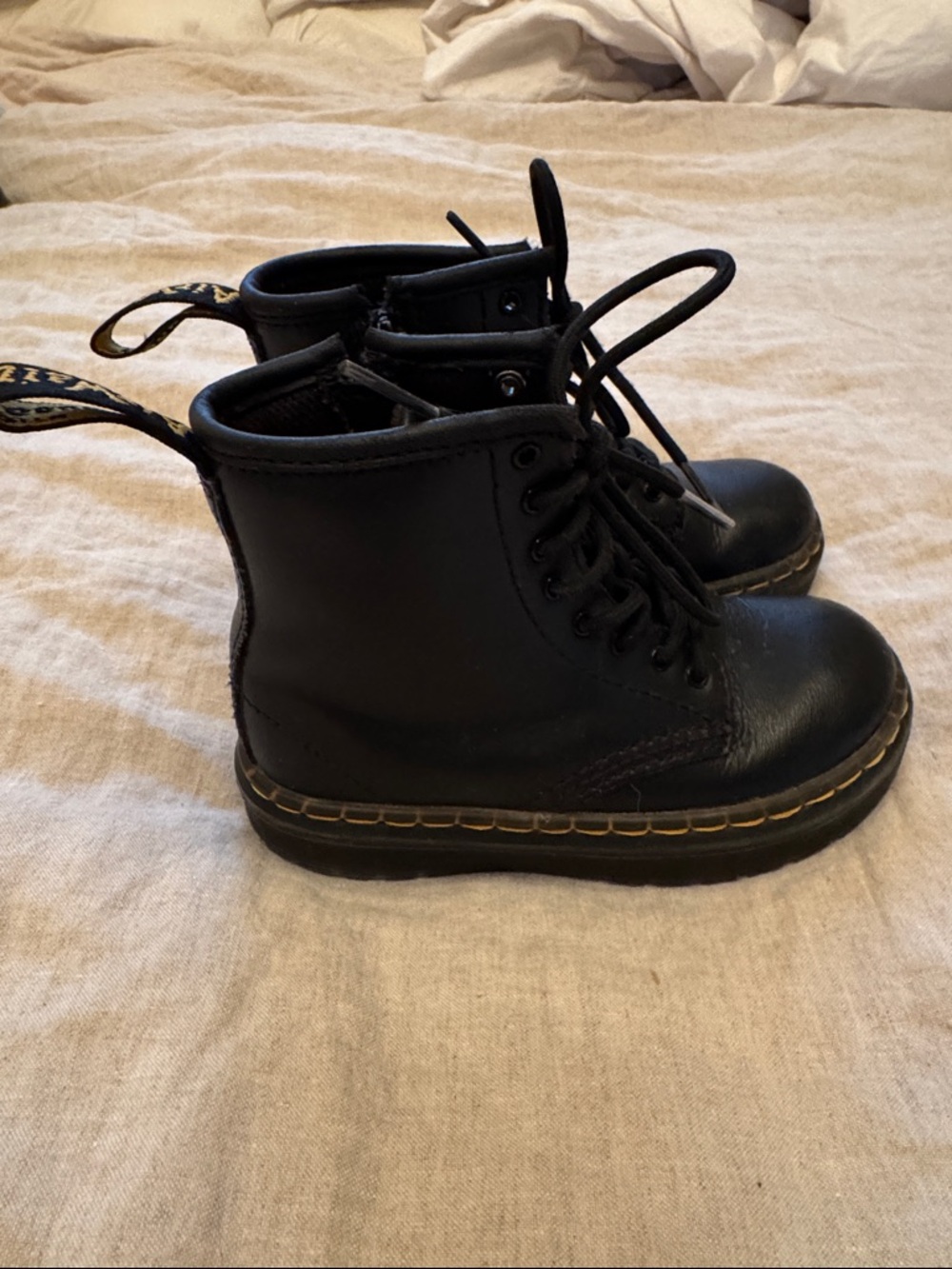 Dr. Martens Kids Black Lace-Up Ankle Boots with Yellow Stitching